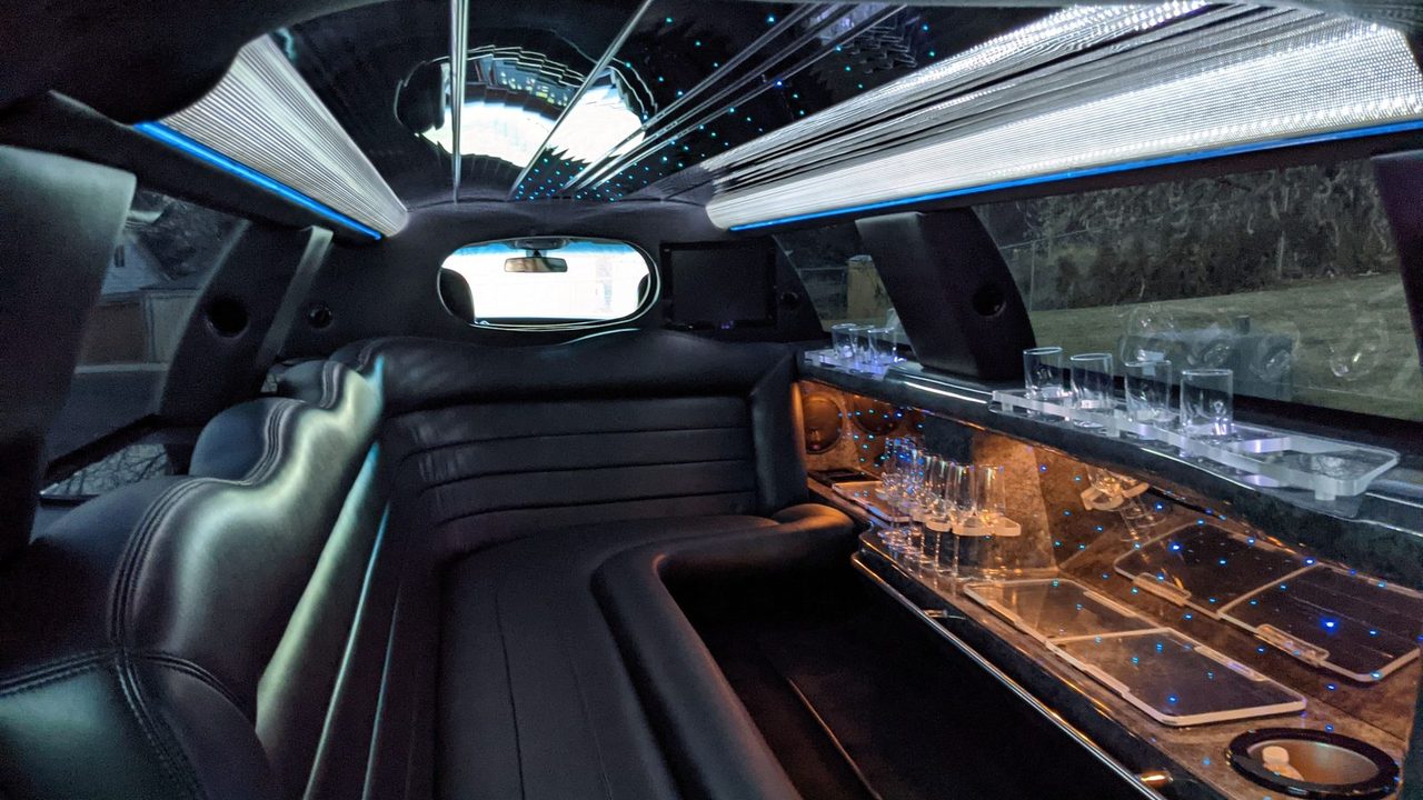 The lit interior of a stretch limousine with its fibre-optic ceiling